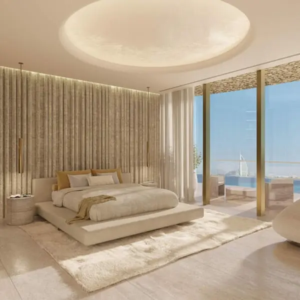 Chambre luxueuse de Maison Margiela Residences à Dubaï avec lit moderne et vue sur piscine privée