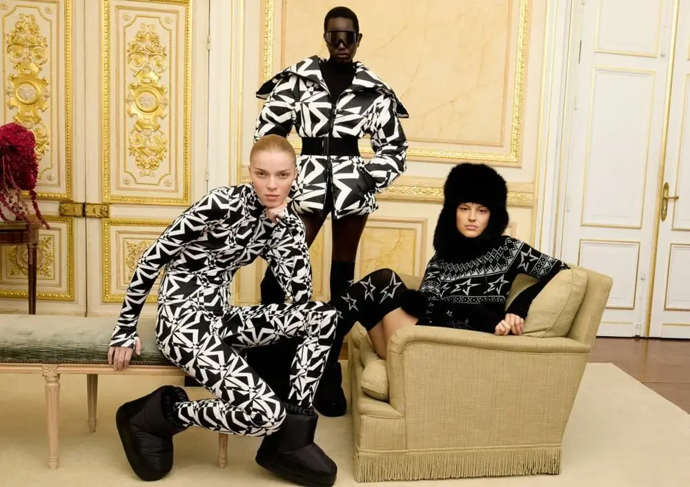 Modèles en tenues d'après-ski graphiques noir et blanc issues de la collection capsule H&M avec Perfect Moment