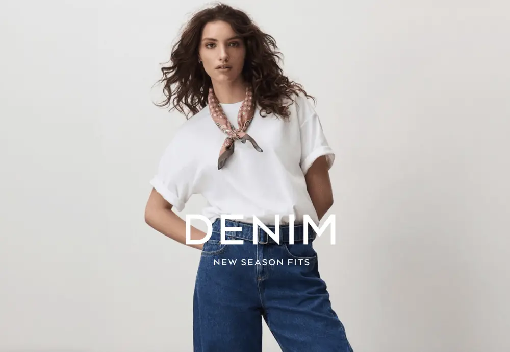 Mannequin portant un tee-shirt blanc et un jean, illustrant l'attrait pour la mode en 2025